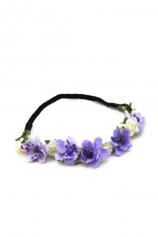 Bandeau avec des fleurs de printemps violettes